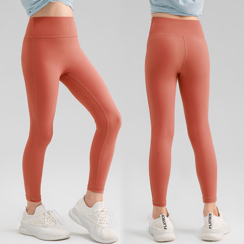 Pantalones de compresión suaves premium al por mayor sin línea T para niñas jóvenes, leggings atléticos de cintura alta para niños, mallas de yoga para jóvenes