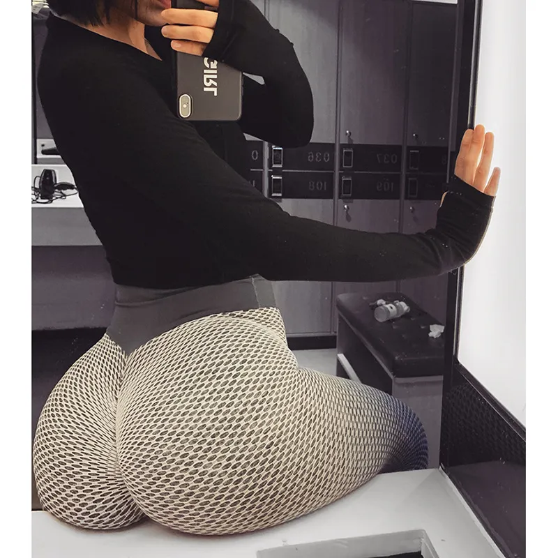 Pantalones de yoga de alta cintura elásticos para fitness en color durazno sin costuras