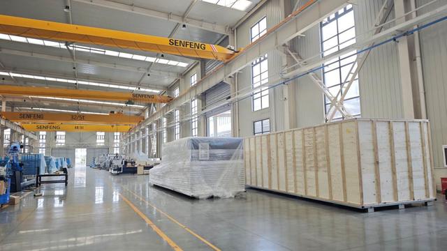 Datum Machine CNC laser cutting equipment in modern factory setting