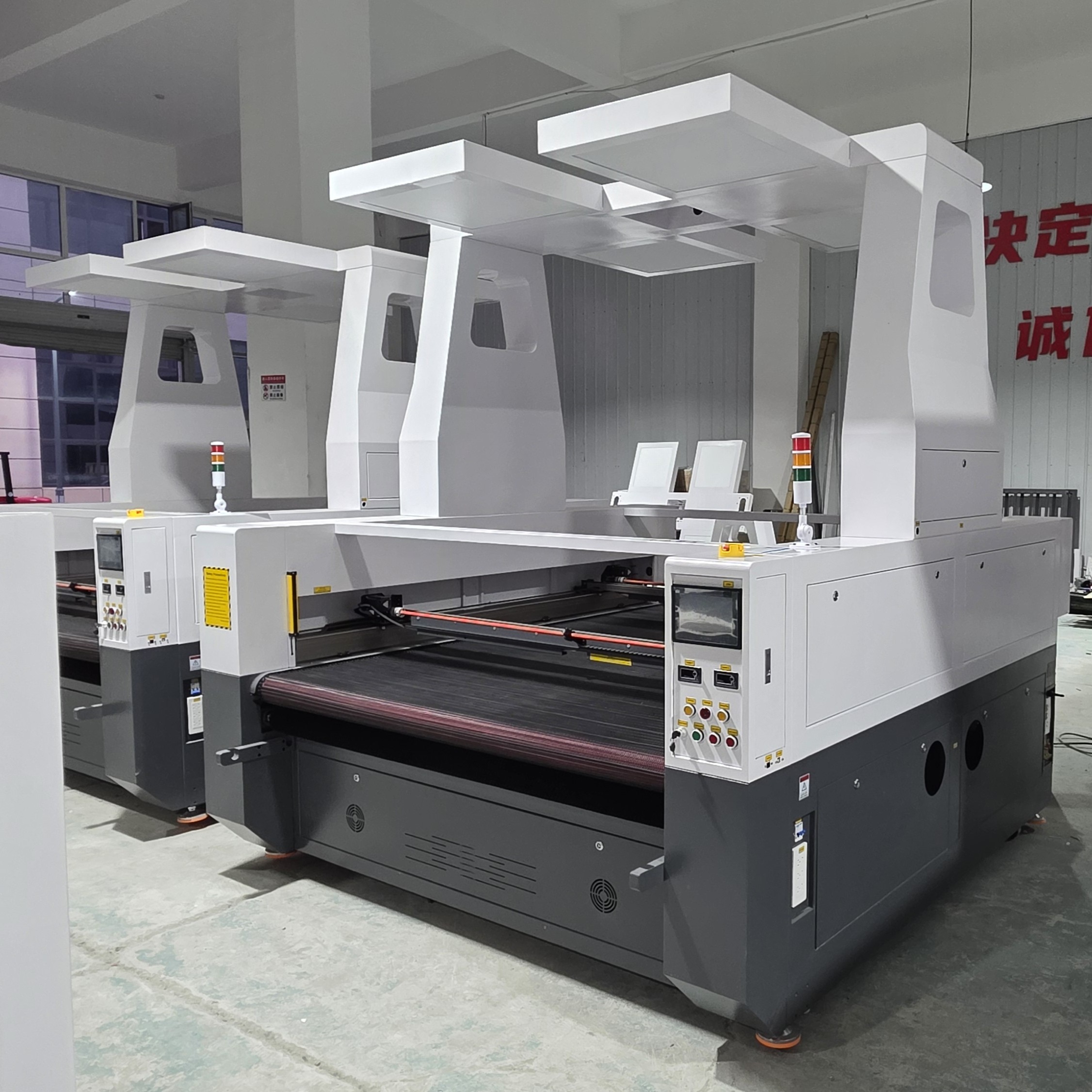 150W Automatic Feeding Nonwoven Fabric Roll Laser Cutting Machine with Visioning CCD Camera Water-Cooled CNC System