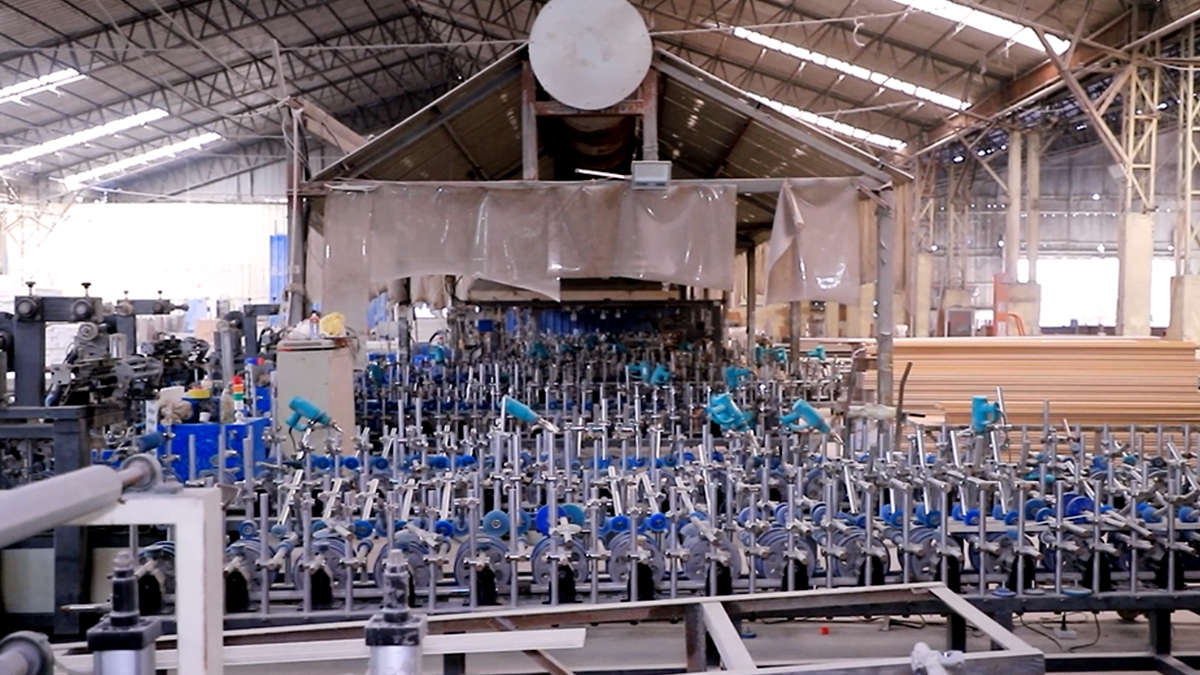 PVC panel laminating process applying decorative surface films at Foshan Haven