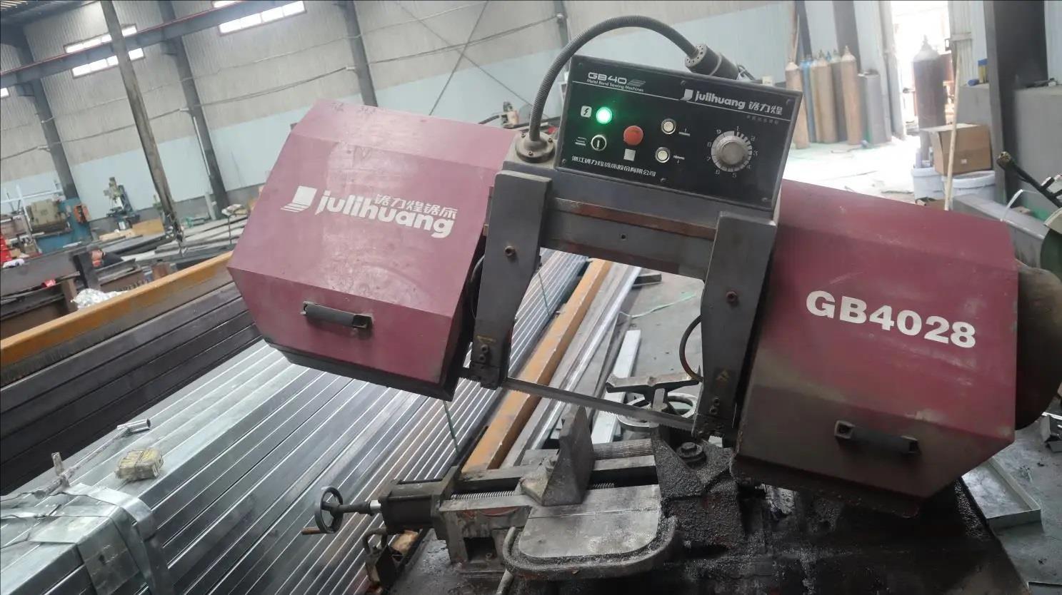 Industrial sawing machine for cutting carbide rod stock at DentFix