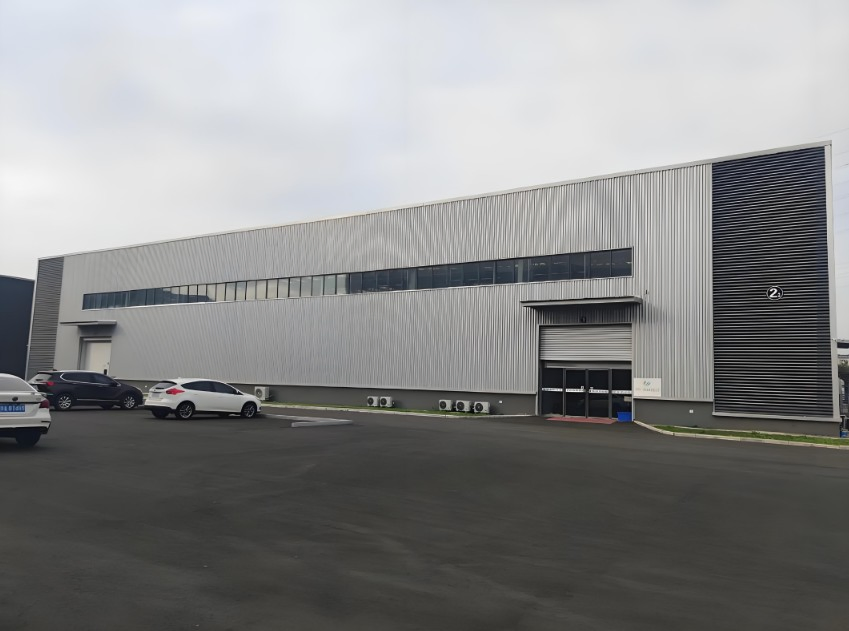 Customized Flexible Warehouse Steel Arch Clear Span Prefabricated Shed Storage Facility Metal Building