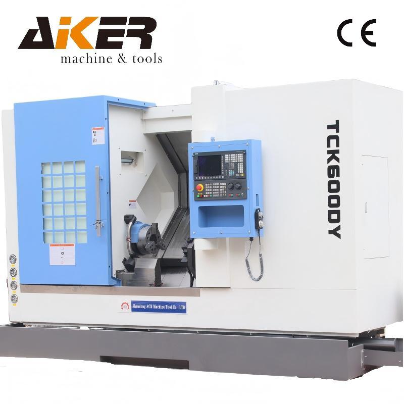Heavy Duty High Efficiency GSK/Siemens/Fanuc Tck600 CNC Turning Center with Bar Feeder with Chip Conveyor for Metal Turning with CE/ISO Living Tool