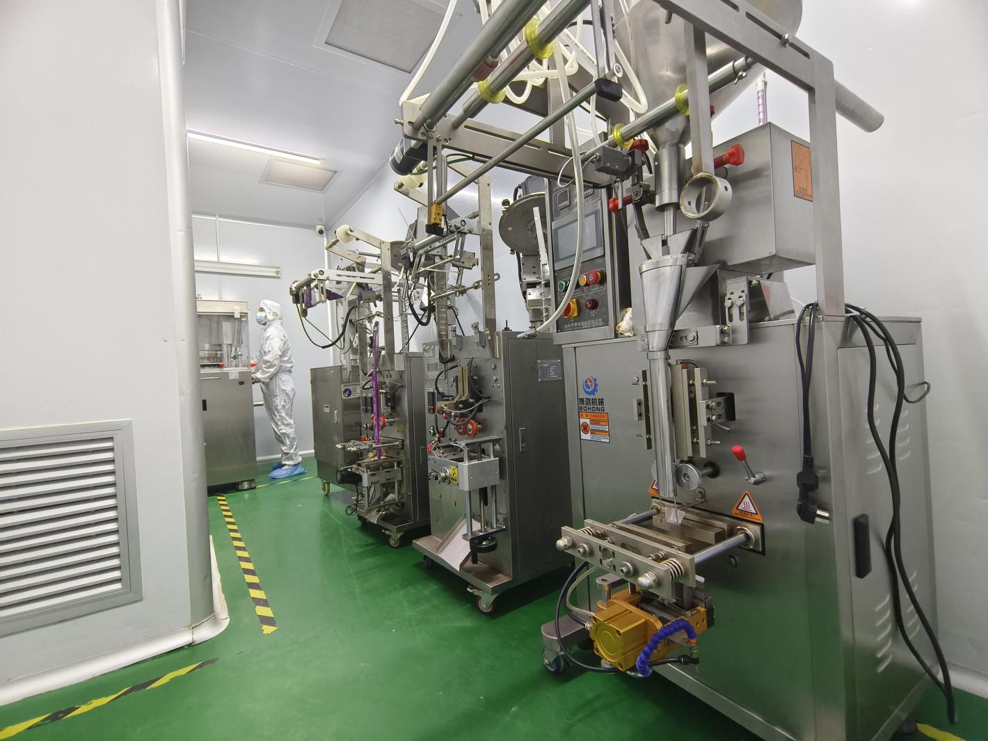 Automated filling machine for botanical extract powder production line