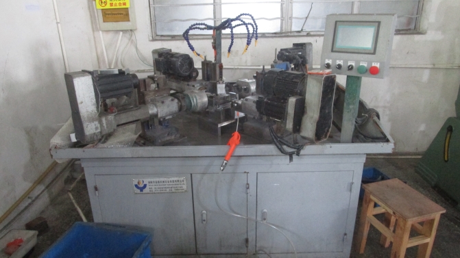 Dixon drilling and tapping integrated machine for high efficiency metal hardware processing