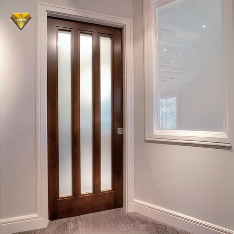 Elegant Wooden Sliding Pocket Door Featuring Stylish Glass Panels