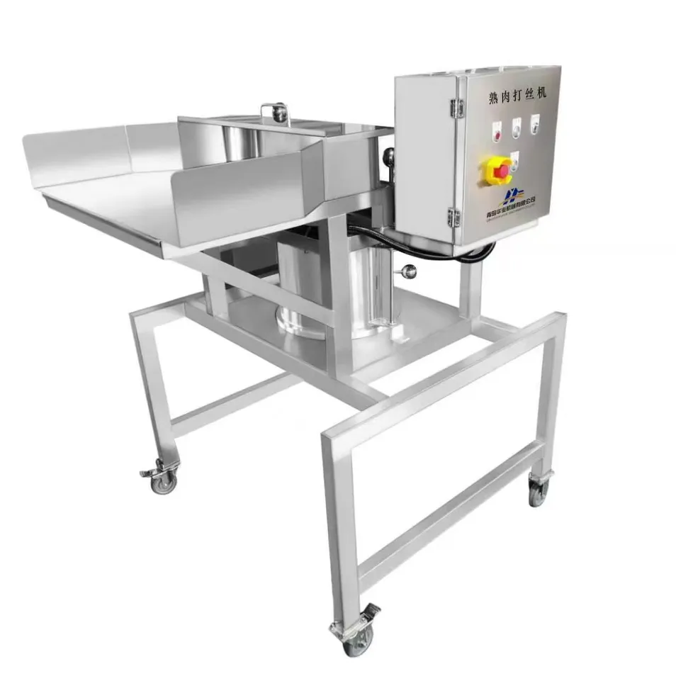 Meat shredding machine
