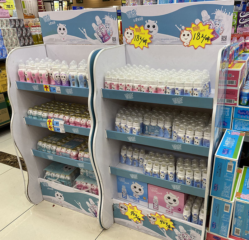 Irregular S Shaped Gravity Feed Display Stand Mineral Substance Water Bottle Display Stands Joyshaker