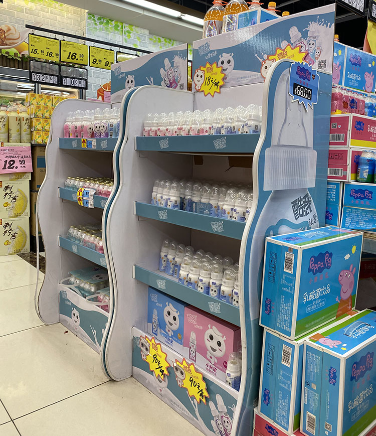 Irregular S Shaped Gravity Feed Display Stand Mineral Substance Water Bottle Display Stands Joyshaker