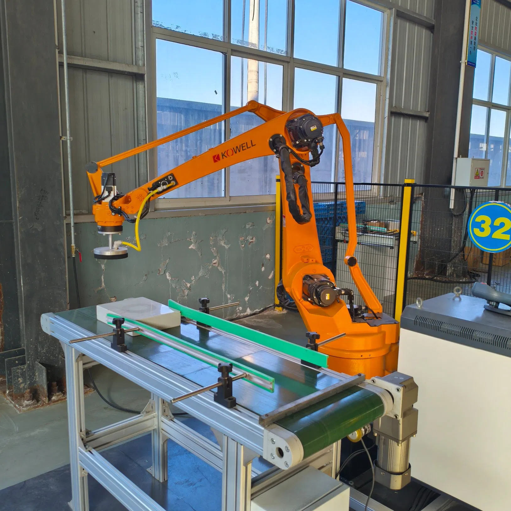 Versatile Four Axis Robot Arm for Efficient Material Handling Solutions