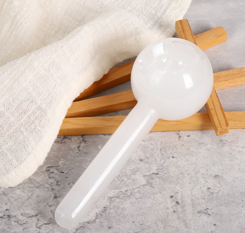 Magic Ice Globes Facial Roller Brown and White Facial Globes Packing 2 Pairs Each Gift Box