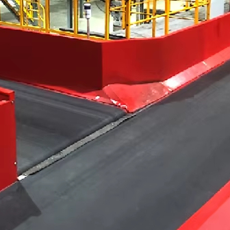 Fully Automated Carton Packing Line Featuring Case Packer, Labeler, and Conveyor System