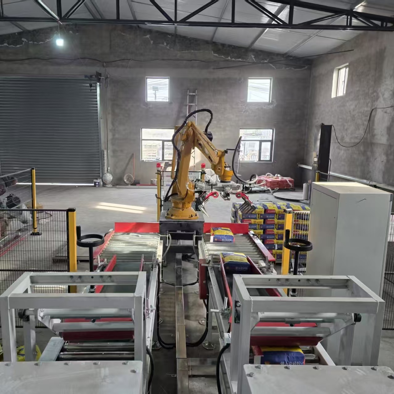 Carton Packaging Machines and Robotic Palletizers for 50 and 25 kg Bag Feed Palletizers