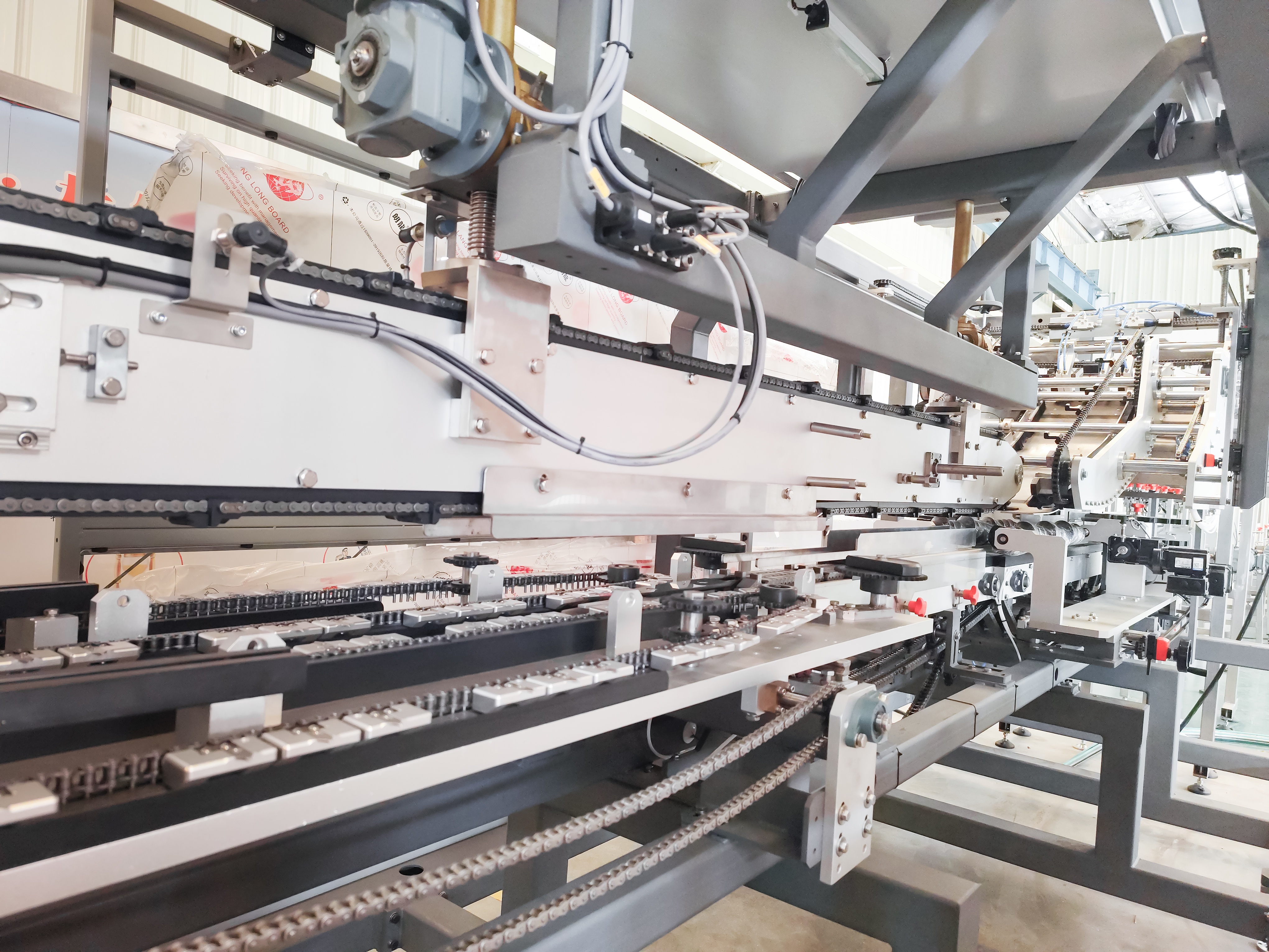 K100 Cardboard Cluster Packaging Machine Case Wrapping And Sealing Machine For Dairy And Water With Long Service Life