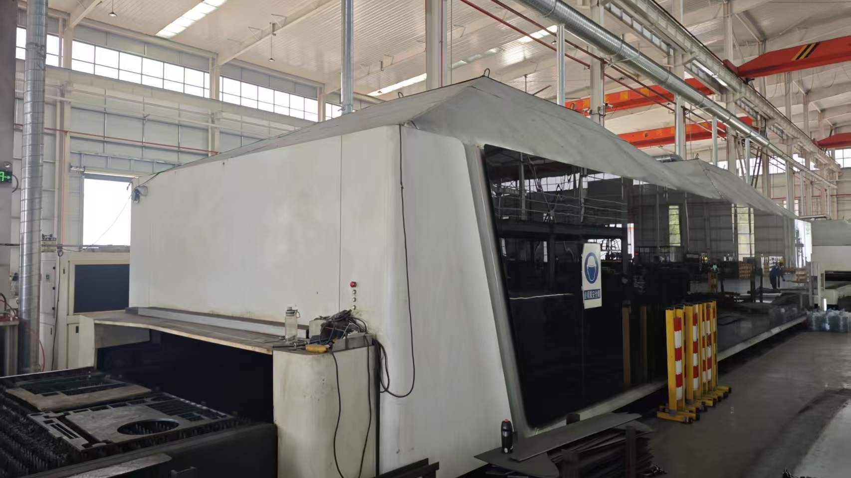Laser cutting machine for precision electrical component manufacturing at EGA Electric