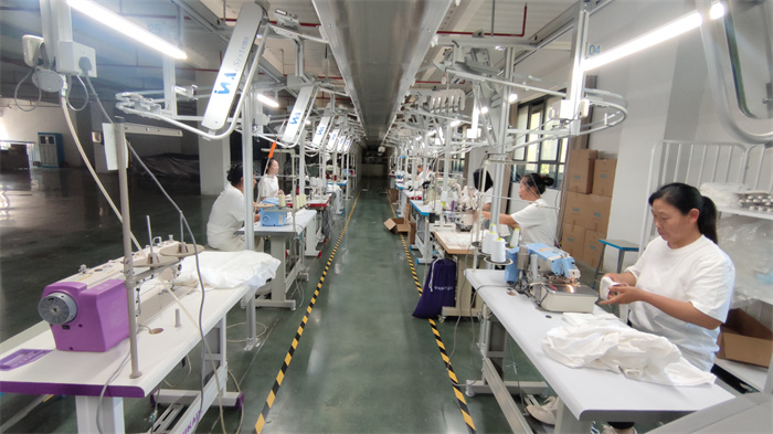 Professional sewing and stitching process at Eglin Fashion