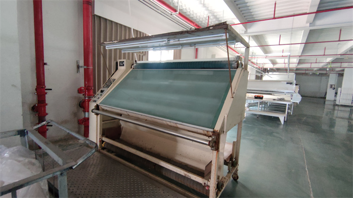 Quality inspection process at Eglin Fashion garment factory