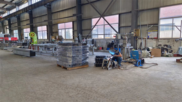Quality control inspection of prefabricated modular panels at Eky Home factory