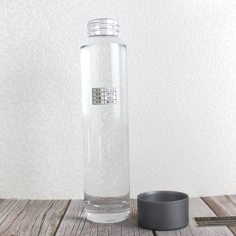 Competitive Price Transparent Voss Mineral Water Bottle Screen Printing 800ml 500ml 385ml 100ml High Flint Juice Drink Beverage Glass Bottle with Plastic Cap