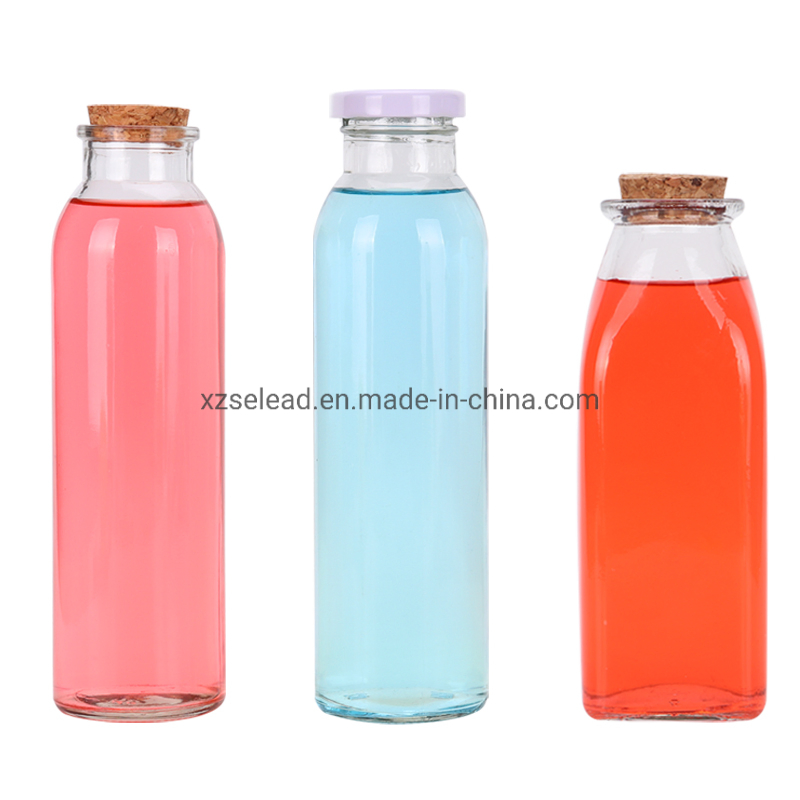Wholesale Round Clear Cold Brew Tea Juice Coffee Glass Bottle for Liquor Beverage with Tin Cover