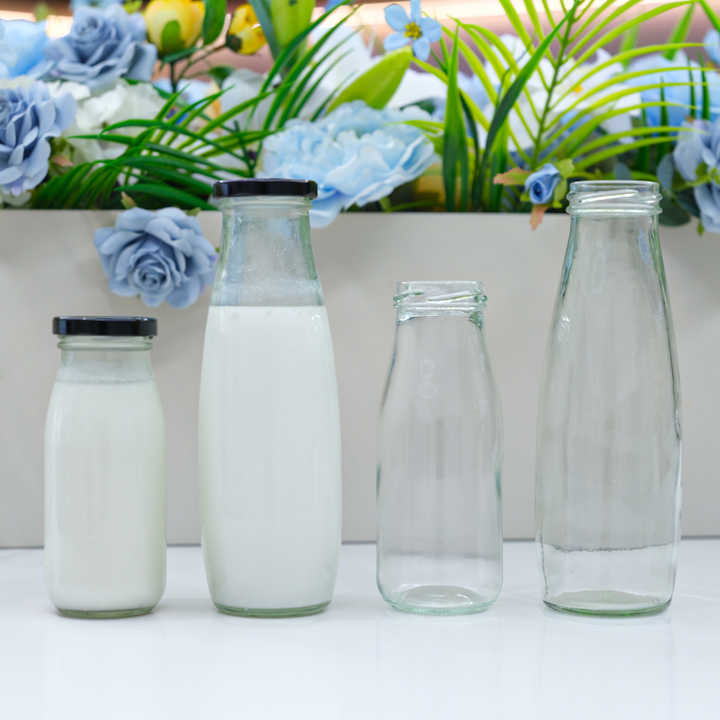 Wholesale High Quality Empty 100ml 250ml 500ml 1 Liter Beverage Milk Juice Glass Bottles with Lid
