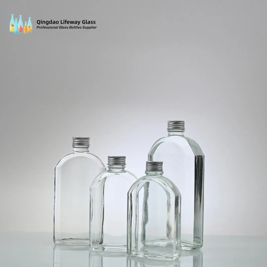 250ml 330ml 500ml 750ml Clear Frosted Glass Spring Water Bottles with Lid for Soda Sparking Water Beverage Juice Packaging with Customzied Logo with Label