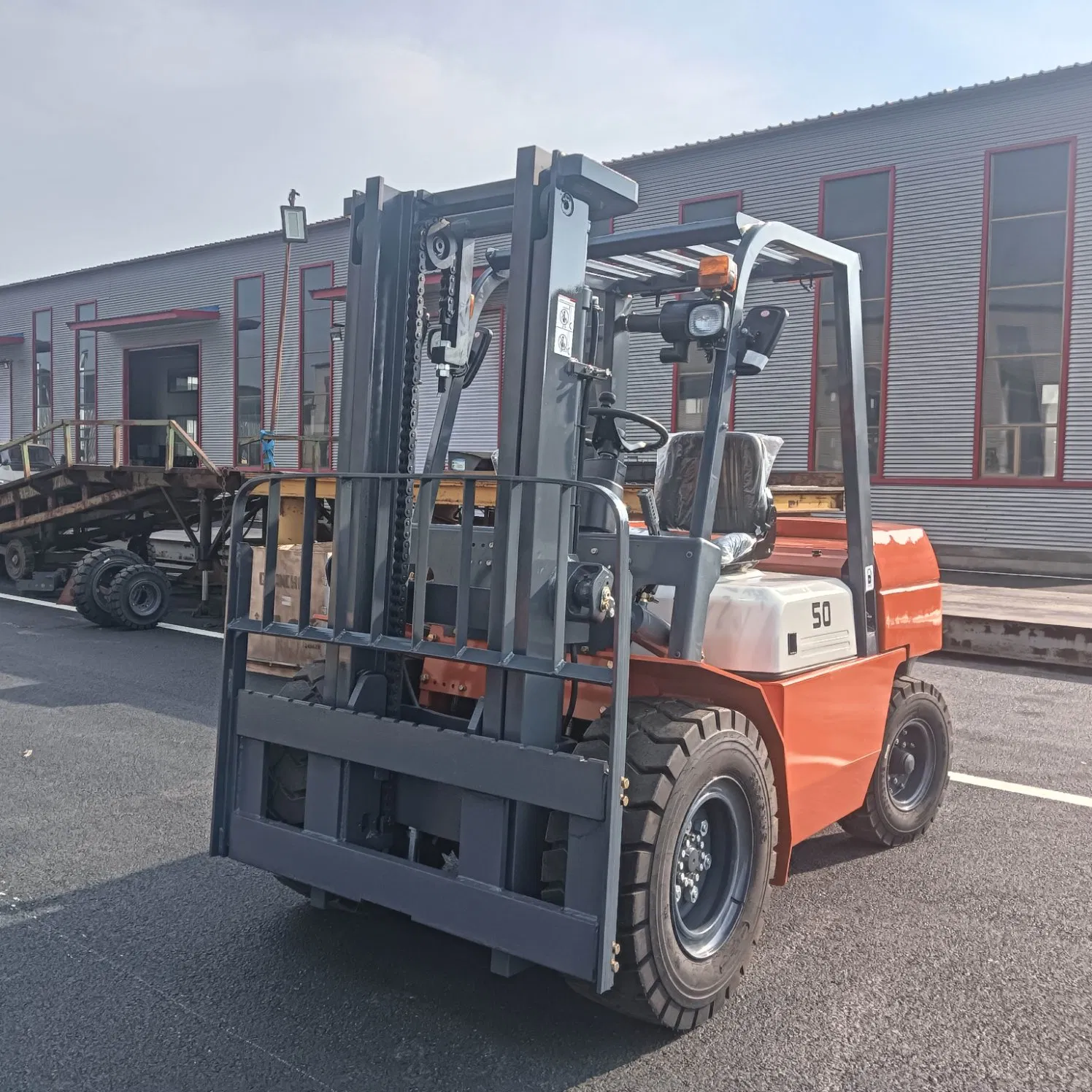 Small Electric Forklift Truck Made in China Cargo Handling Lift Truck Seat Driving Forklift Truck