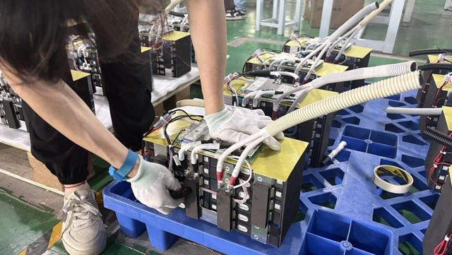 GAF Energy modern lithium battery factory production floor with automated equipment