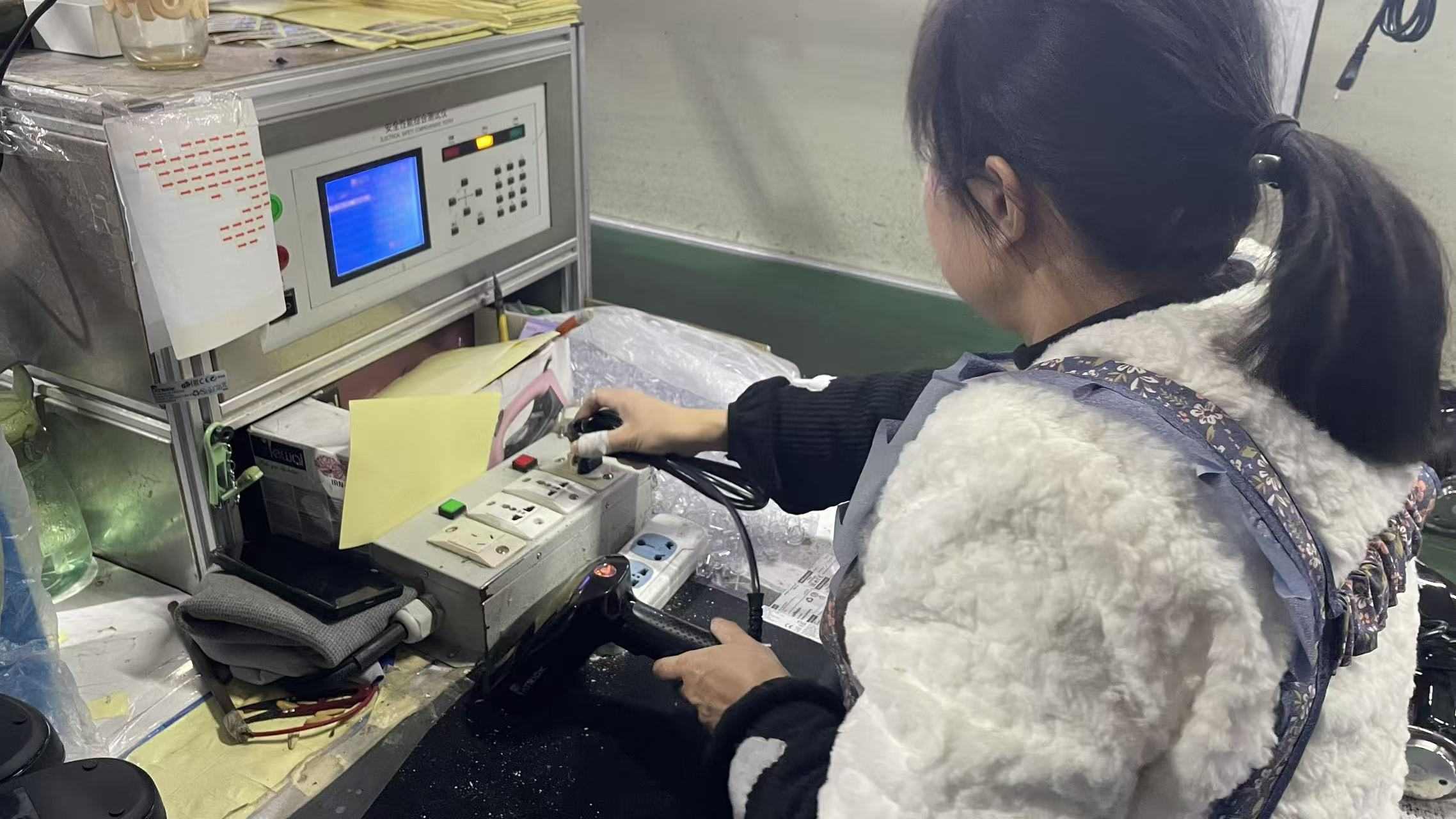 Electronic vape device testing and quality control at Esaturn manufacturing facility