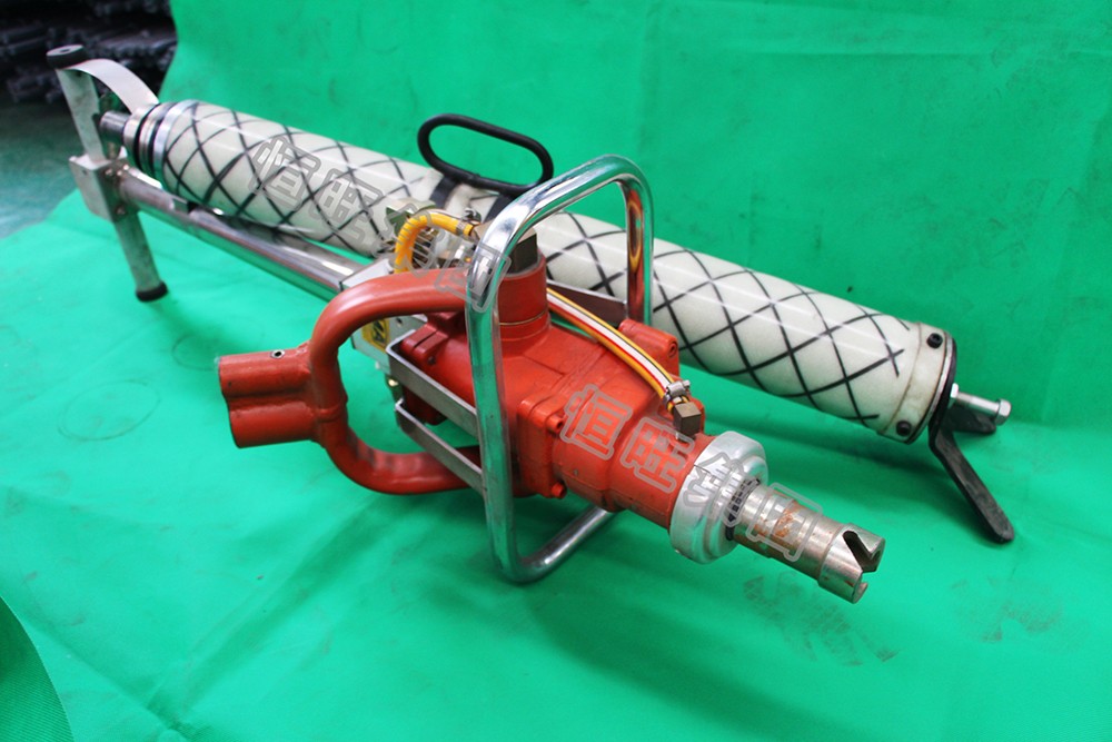 Pneumatic anchor drilling rig close up