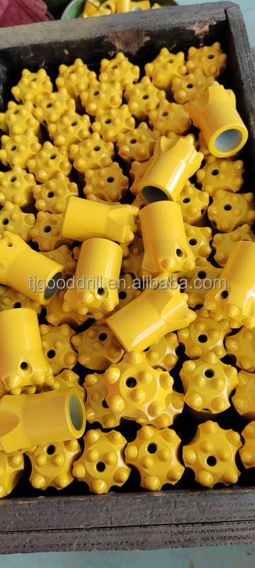 Short skirt button drill bit