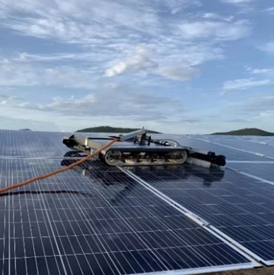 Night-Operable and Waterproof Solar Panel Cleaning Robot for Harsh Environments