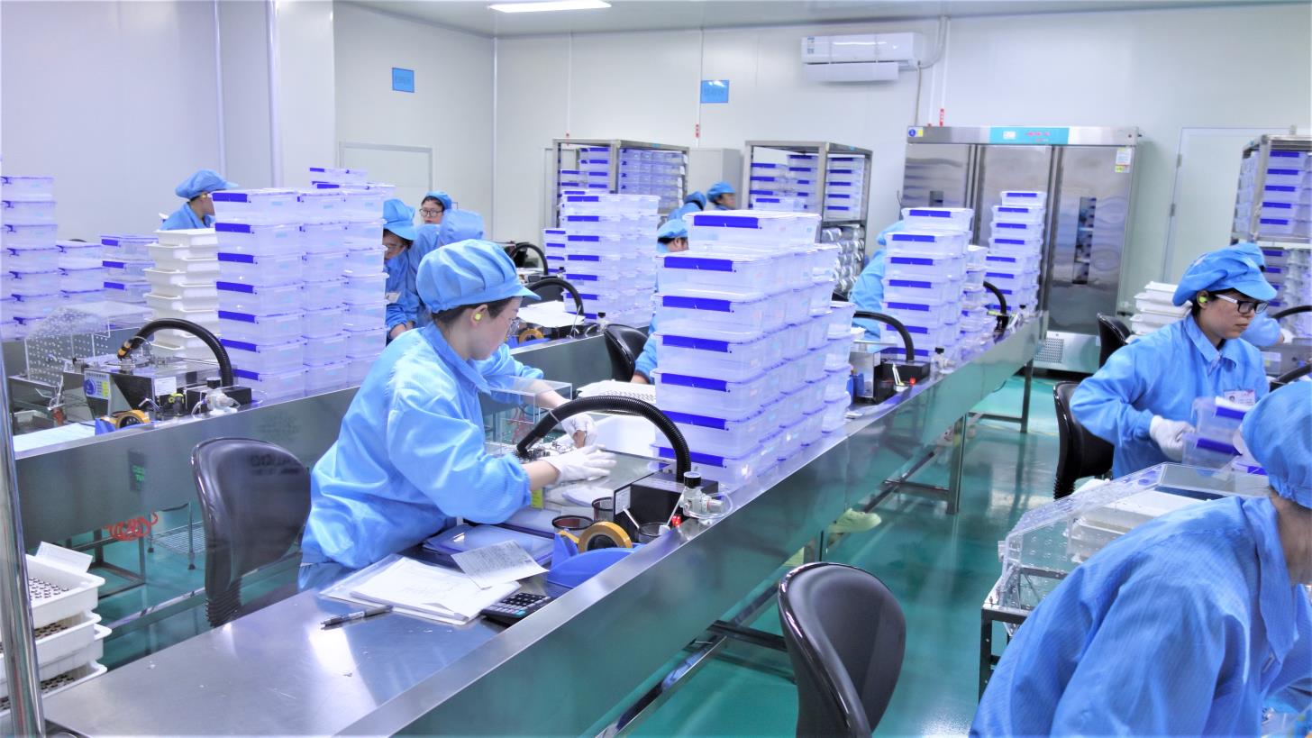 Film suction machine used in colored contact lens manufacturing process