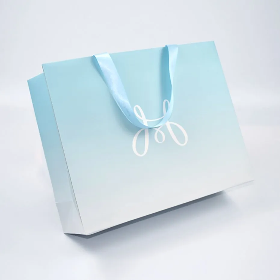 Saco de Papel Luxuoso Ecológico com Alça Personalizado com Logo Impresso para Embalagem de Joias e Cosméticos em Boutique