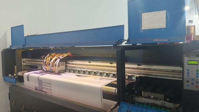 Guangzhou Faber Fashion manufacturing office and design workspace showing modern apparel samples.
