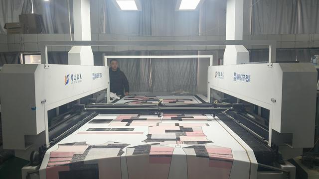 Completed women's apparel on racks waiting for final packaging and logistics distribution.