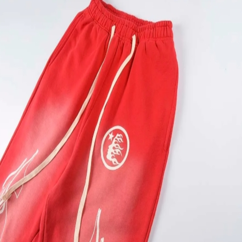 Hellstar Red Flared Leg Jogger Pants with Flame Graphic Design and Logo Print
