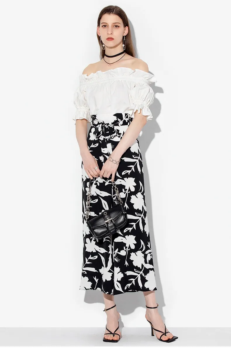 Model wearing wide-leg trousers view 3