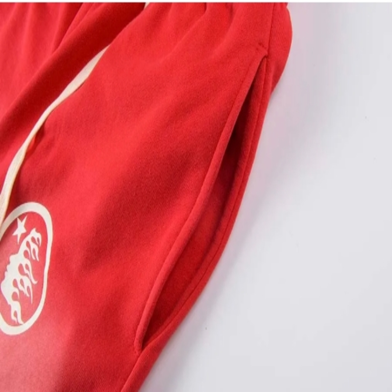 Hellstar Red Flared Leg Jogger Pants with Flame Graphic Design and Logo Print