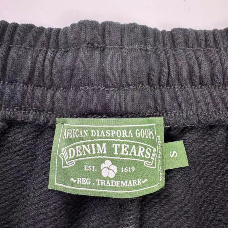 Denim Tears Track Pants Athletic Street Look with Custom Graphic Design