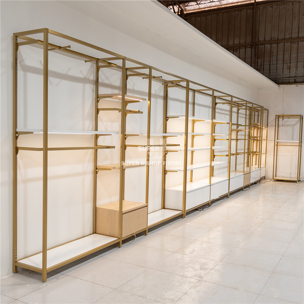 Fashion Clothing Store Shelf Design Clothing Store Decoration Gold Stainless Steel Shelf With Light