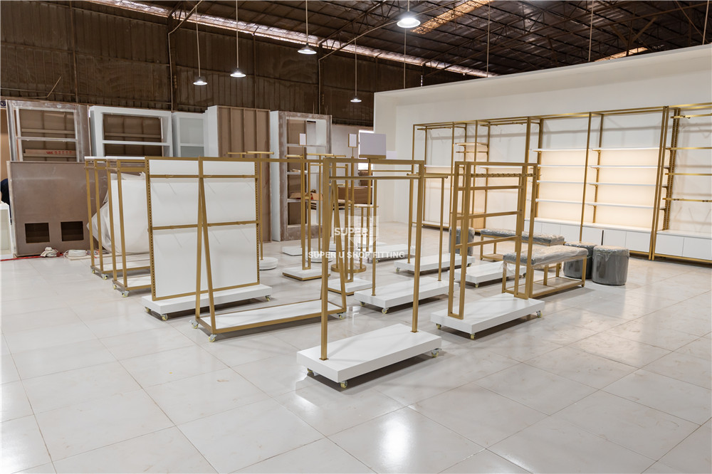 Fashion Clothing Store Shelf Design Clothing Store Decoration Gold Stainless Steel Shelf With Light