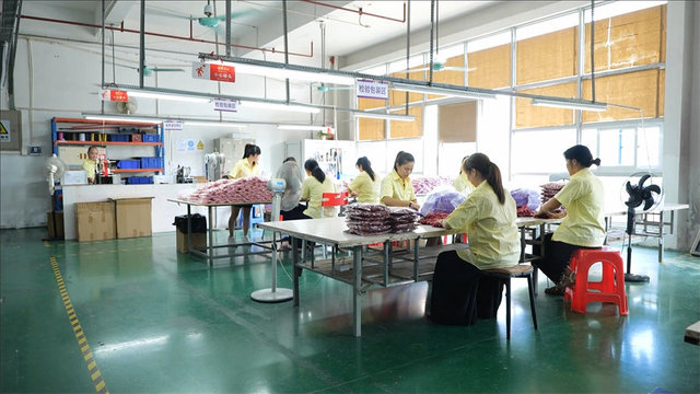 Quality control and fabric selection at Galz Fashion factory