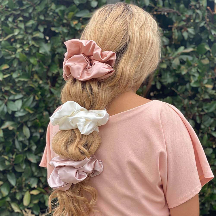 Silk scrunchies protecting hair from breakage