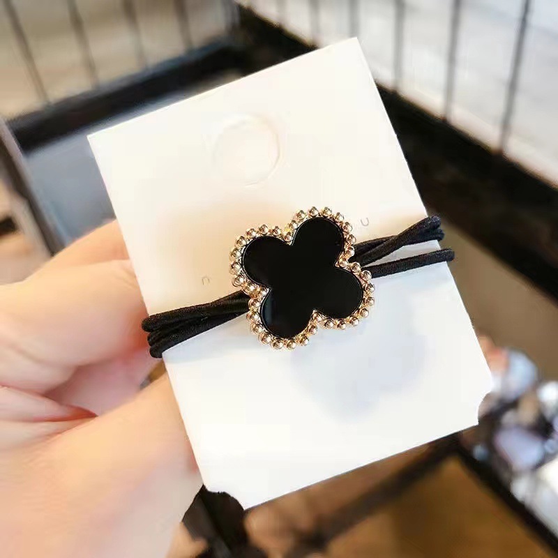 High Quality Women's Retro Pearl Hair Ties New Designer Four-Leaf Clover Black Head Hair Rope Sweet Wholesale Rubber Band