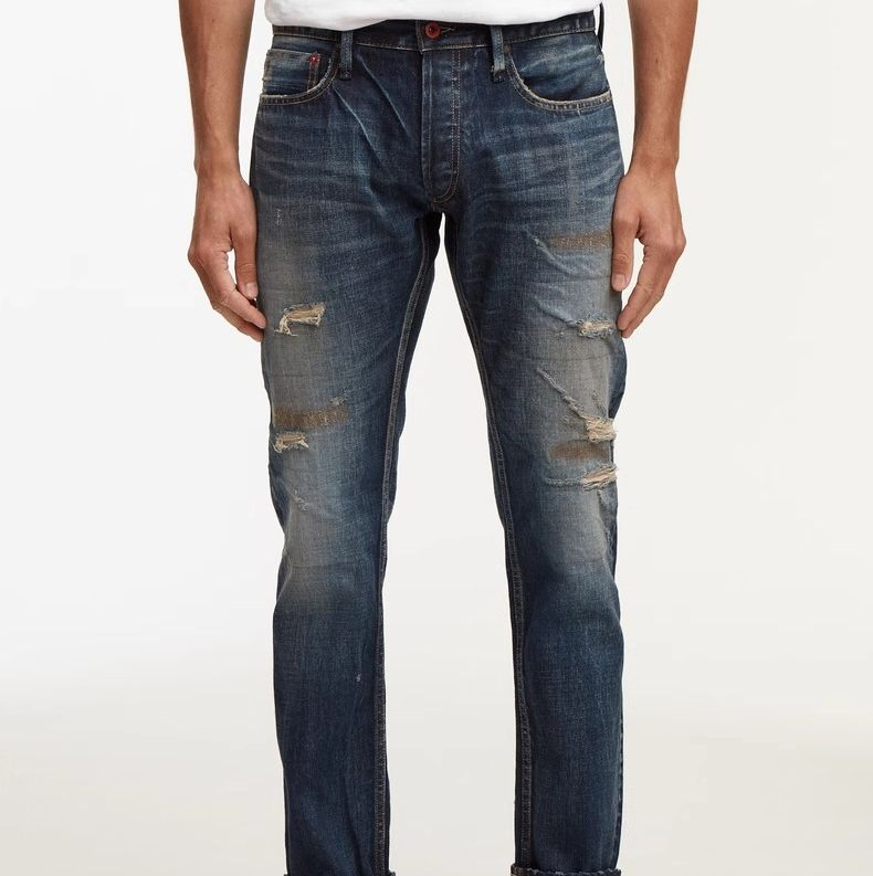 Classic Blue Jeans with Distressed Detailing for Everyday Wear