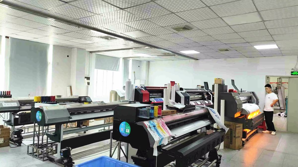 Industrial printing machine for custom garment production at NovaFair factory