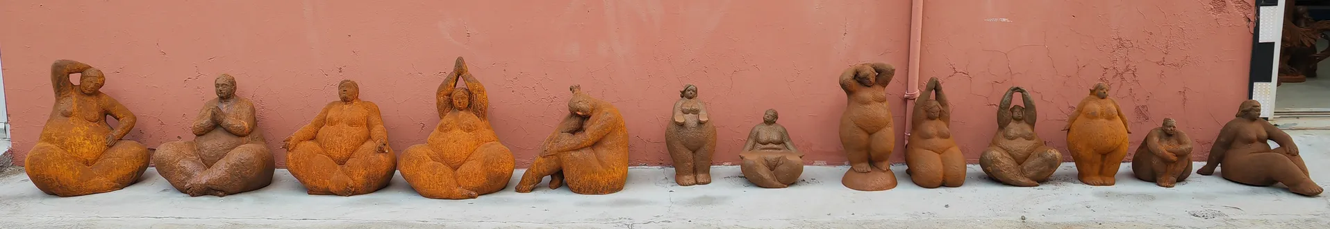 Iron Obese Woman Sculpture Banner