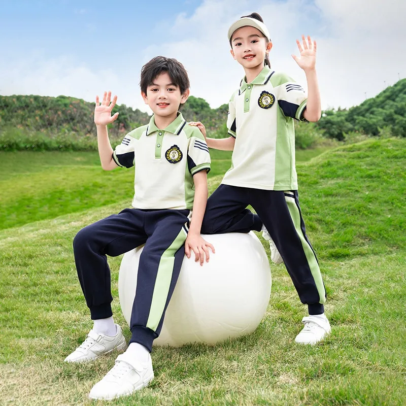 Falda de uniforme escolar y camiseta polo para niños deportivos personalizada de OEM en China